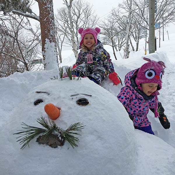 snow man fun in the front yard at Kuma Lodge